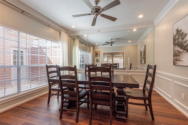 1907 Garden Fern Ct, Houston, TX 77062 - dining room with crown molding, dark wood-type flooring, a textured ceiling, a ceiling fan, and a decorative wall