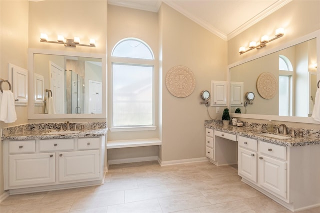 1907 Garden Fern Ct, Houston, TX 77062 - full bathroom featuring two vanities, crown molding, a shower stall, and a towering ceiling