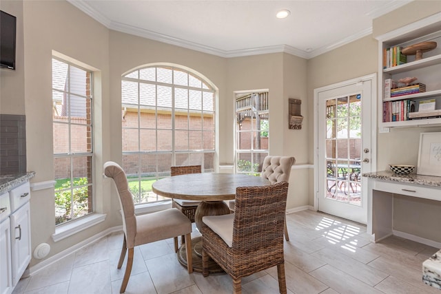 1907 Garden Fern Ct, Houston, TX 77062 - dining room with crown molding and recessed lighting