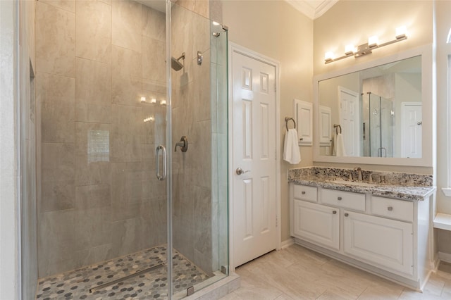 1907 Garden Fern Ct, Houston, TX 77062 - bathroom featuring ornamental molding, a stall shower, and vanity