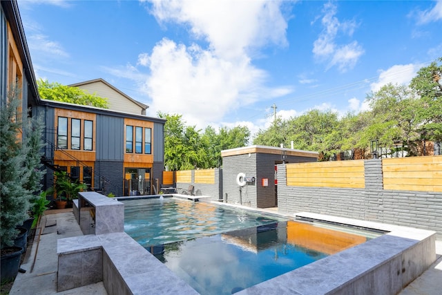 2703 Mason St Unit 13, Houston, TX 77006 - view of swimming pool featuring a patio area