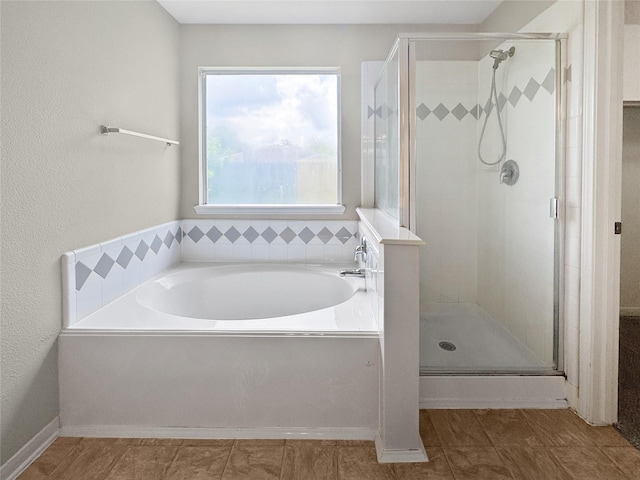 19327 Harvest Stream Way, Houston, TX 77084 - bathroom featuring a stall shower and a bath