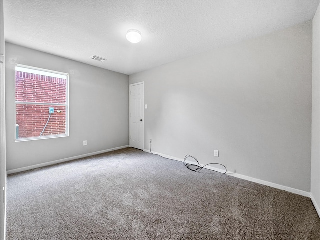19327 Harvest Stream Way, Houston, TX 77084 - carpeted empty room with baseboards and a textured ceiling