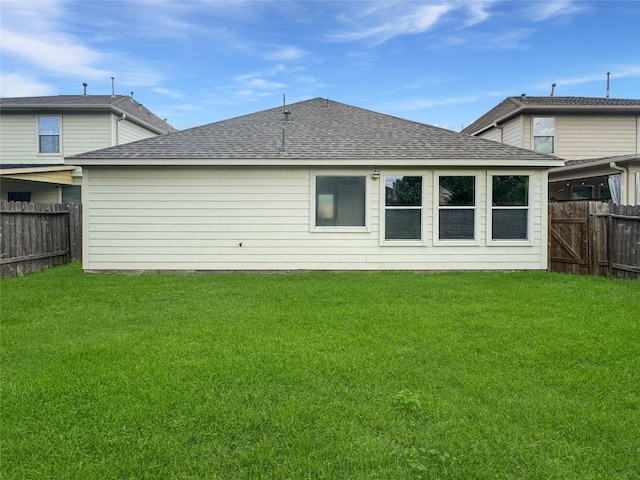 19327 Harvest Stream Way, Houston, TX 77084 - back of property with a fenced backyard and a shingled roof