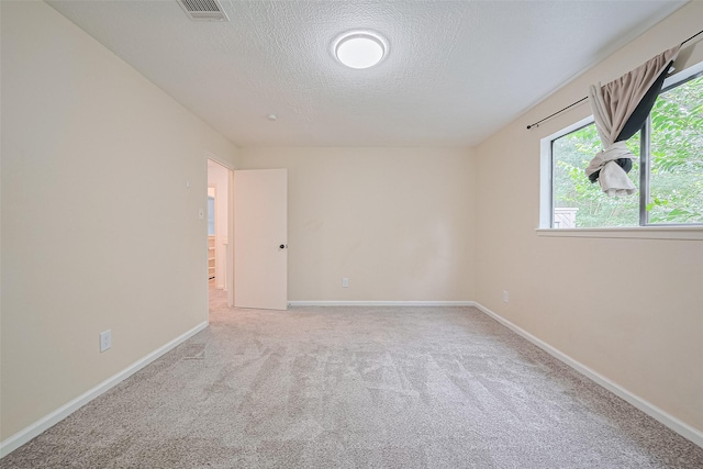 2107 Shadowbriar Dr, Houston, TX 77077 - carpeted empty room with a textured ceiling and baseboards