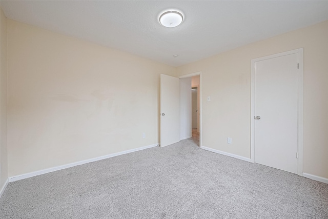 2107 Shadowbriar Dr, Houston, TX 77077 - unfurnished bedroom with carpet flooring and baseboards