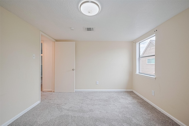 2107 Shadowbriar Dr, Houston, TX 77077 - empty room with carpet flooring and a textured ceiling