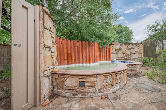 2107 Shadowbriar Dr, Houston, TX 77077 - view of patio with an outdoor hot tub