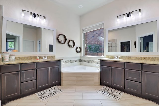 27163 Allenby Park Dr, Magnolia, TX 77354 - bathroom with vanity, a garden tub, a shower, and tile patterned floors