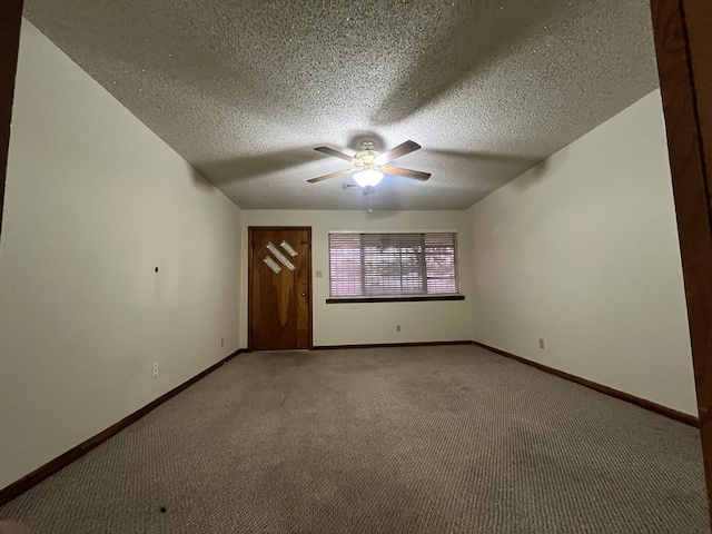 7541 Werner St, Houston, TX 77037 - unfurnished room featuring ceiling fan, light carpet, and a textured ceiling