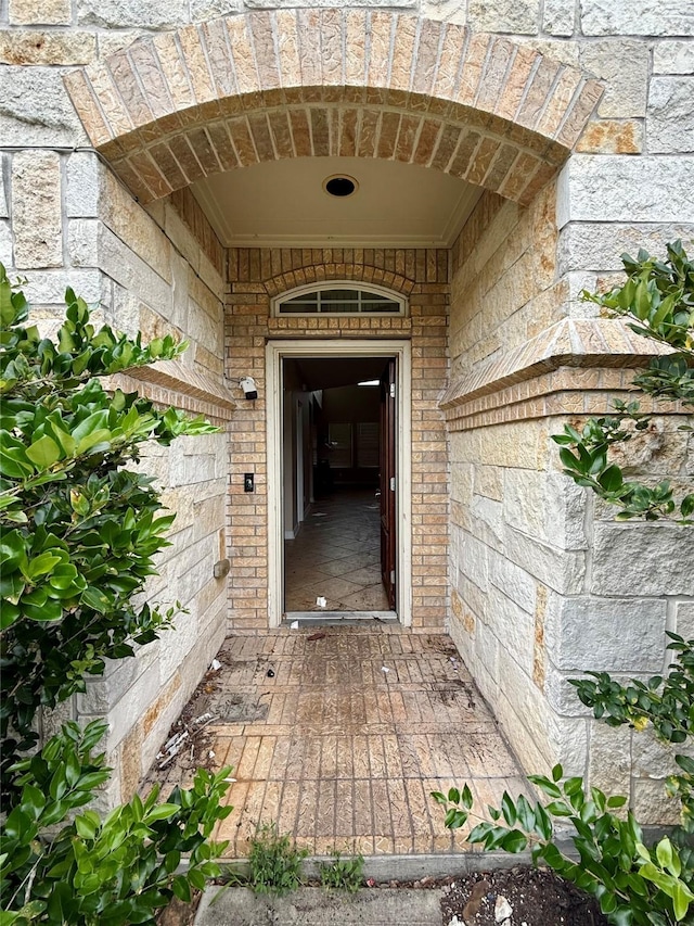 12503 Pepper Creek Ln, Pearland, TX 77584 - doorway to property with stone siding
