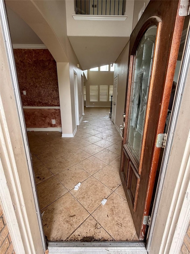 12503 Pepper Creek Ln, Pearland, TX 77584 - corridor with light tile patterned floors and baseboards