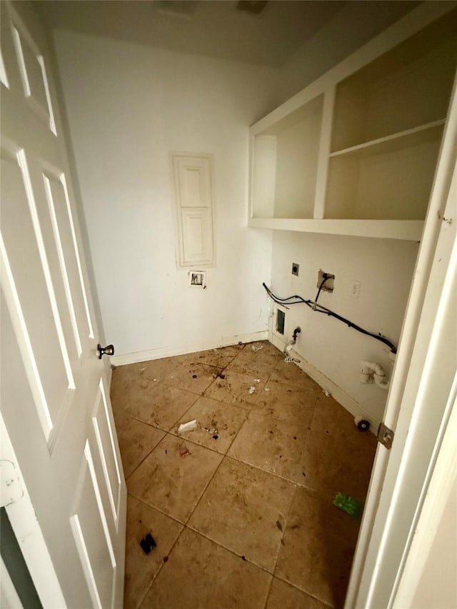 12503 Pepper Creek Ln, Pearland, TX 77584 - laundry room featuring gas dryer hookup, electric dryer hookup, and tile patterned floors