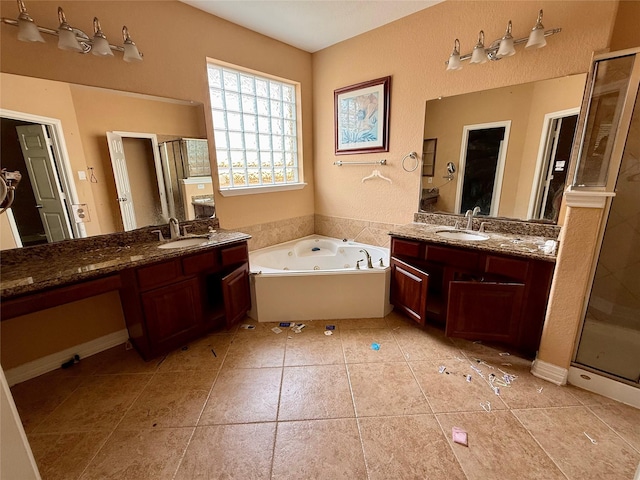 12503 Pepper Creek Ln, Pearland, TX 77584 - bathroom with a stall shower, a whirlpool tub, two vanities, and tile patterned flooring
