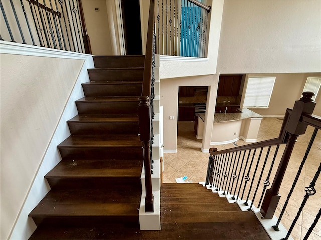12503 Pepper Creek Ln, Pearland, TX 77584 - stairs with baseboards and tile patterned floors