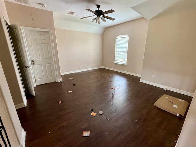 12503 Pepper Creek Ln, Pearland, TX 77584 - empty room with ceiling fan, dark wood-style floors, vaulted ceiling, and a smoke detector