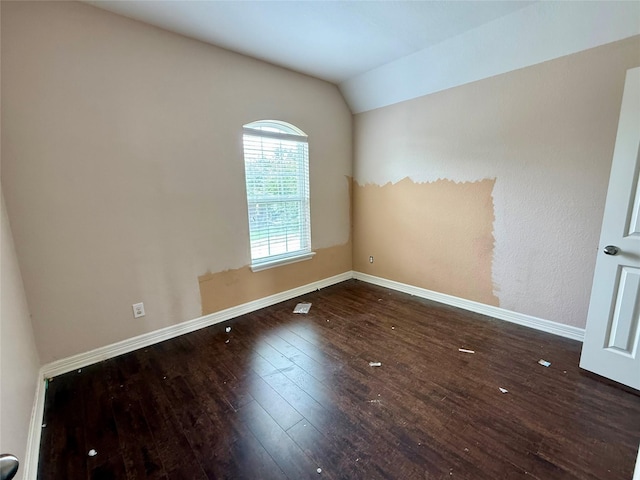 12503 Pepper Creek Ln, Pearland, TX 77584 - empty room featuring wood-type flooring and lofted ceiling