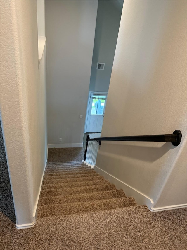 6106 Yesenia St, Katy, TX 77449 - stairway with carpet flooring and a high ceiling