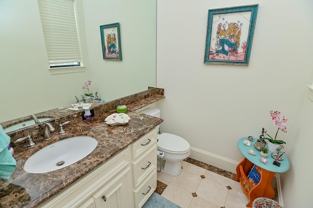 1307 W Bell St, Houston, TX 77019 - half bathroom with vanity and tile patterned floors
