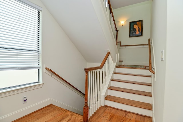 1307 W Bell St, Houston, TX 77019 - staircase featuring wood finished floors