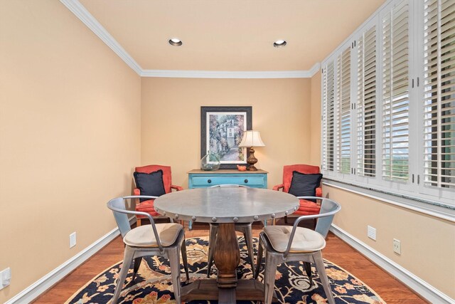 14655 Champion Forest Dr Unit 1704, Houston, TX 77069 - dining space with crown molding, wood finished floors, and recessed lighting