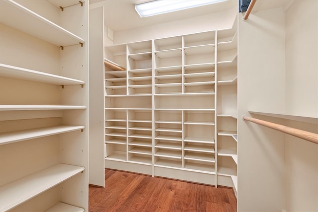 14655 Champion Forest Dr Unit 1704, Houston, TX 77069 - spacious closet with wood finished floors