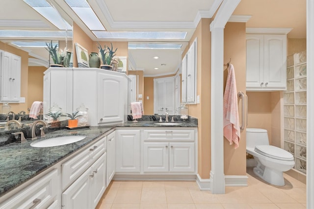 14655 Champion Forest Dr Unit 1704, Houston, TX 77069 - full bath with double vanity, tile patterned flooring, and ornamental molding
