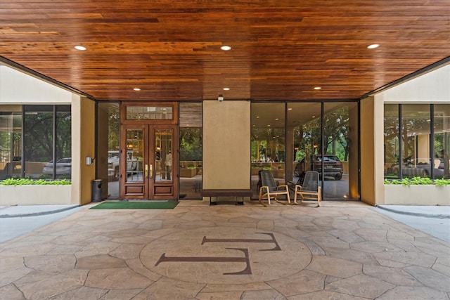 14655 Champion Forest Dr Unit 1704, Houston, TX 77069 - entrance to property with french doors and a patio area