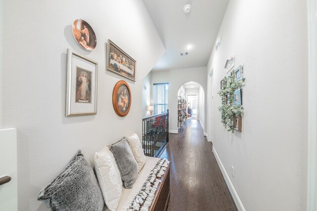 1516 Cohn St, Houston, TX 77007 - corridor featuring arched walkways, dark wood-type flooring, and recessed lighting