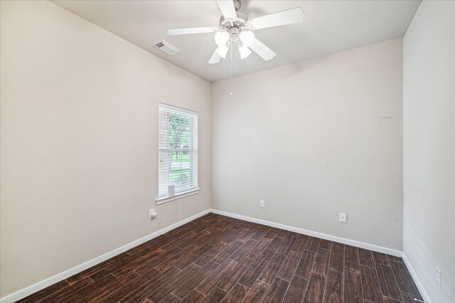 20779 Oakhurst Meadows Dr, Porter, TX 77365 - unfurnished room with dark wood-type flooring and ceiling fan