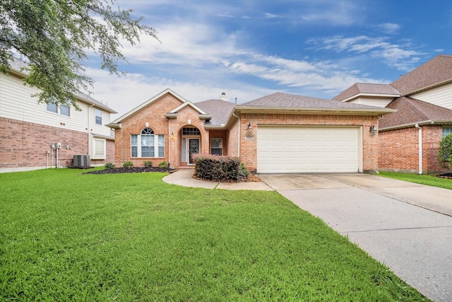 20779 Oakhurst Meadows Dr, Porter, TX 77365 - traditional-style home featuring brick siding, a garage, concrete driveway, a front lawn, and a shingled roof