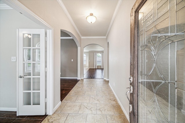 20779 Oakhurst Meadows Dr, Porter, TX 77365 - entrance foyer featuring arched walkways and crown molding