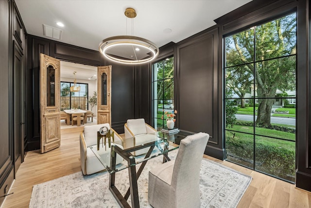 2220 Pelham Dr, Houston, TX 77019 - office space featuring a decorative wall, light wood-type flooring, and recessed lighting