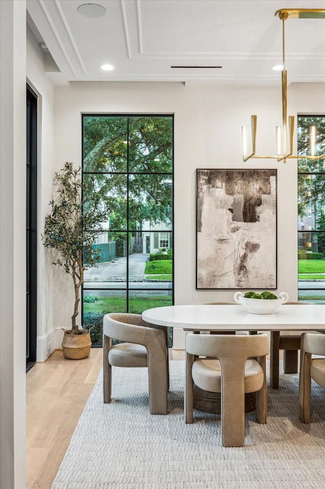 2220 Pelham Dr, Houston, TX 77019 - dining area featuring plenty of natural light, wood finished floors, and recessed lighting