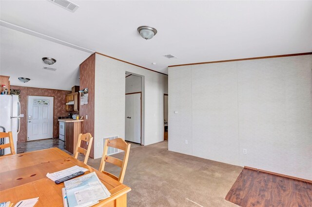 637 Troy St, Anahuac, TX 77514 - dining space featuring light colored carpet