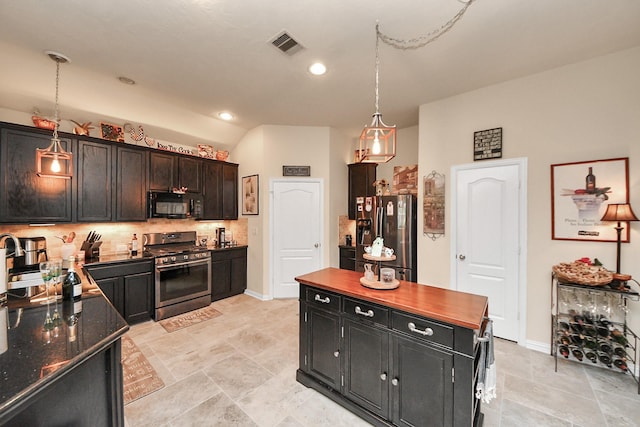22819 Jetty Manor Ln, Spring, TX 77373 - kitchen featuring stainless steel appliances, backsplash, decorative light fixtures, a kitchen island, and recessed lighting