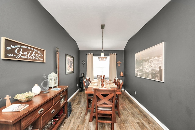 22819 Jetty Manor Ln, Spring, TX 77373 - dining room featuring lofted ceiling and wood finished floors