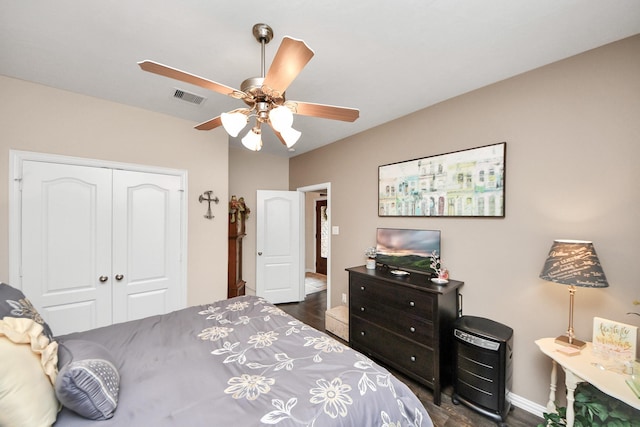 22819 Jetty Manor Ln, Spring, TX 77373 - bedroom featuring a closet, dark wood-style floors, and ceiling fan