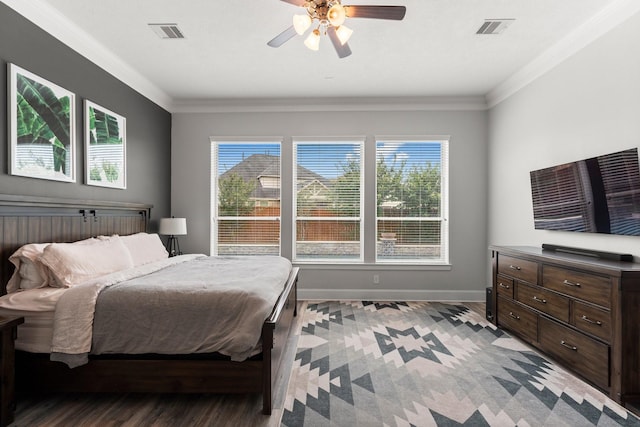 31013 Sunfall Trail Ln, Spring, TX 77386 - bedroom with crown molding, multiple windows, light wood finished floors, and ceiling fan