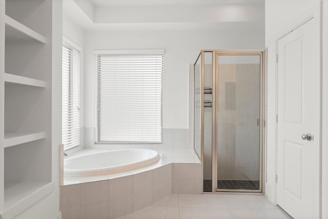 31013 Sunfall Trail Ln, Spring, TX 77386 - full bath with a garden tub, a stall shower, and tile patterned flooring