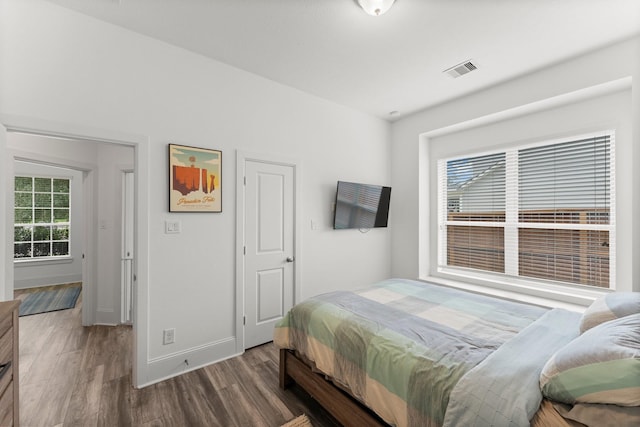 31013 Sunfall Trail Ln, Spring, TX 77386 - bedroom with wood finished floors and baseboards