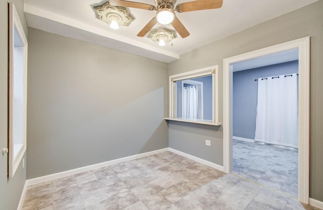 523 N Jenkins St, Houston, TX 77003 - spare room featuring a ceiling fan and baseboards