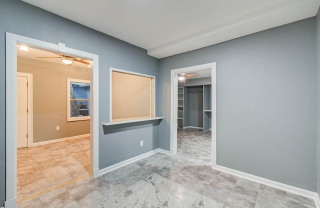 523 N Jenkins St, Houston, TX 77003 - unfurnished room with a ceiling fan and baseboards