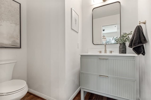 8018 Twining Oaks Ln, Spring, TX 77379 - half bath with vanity and wood finished floors