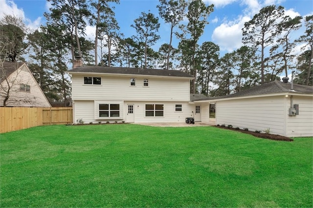 8018 Twining Oaks Ln, Spring, TX 77379 - back of property featuring a patio area and a chimney