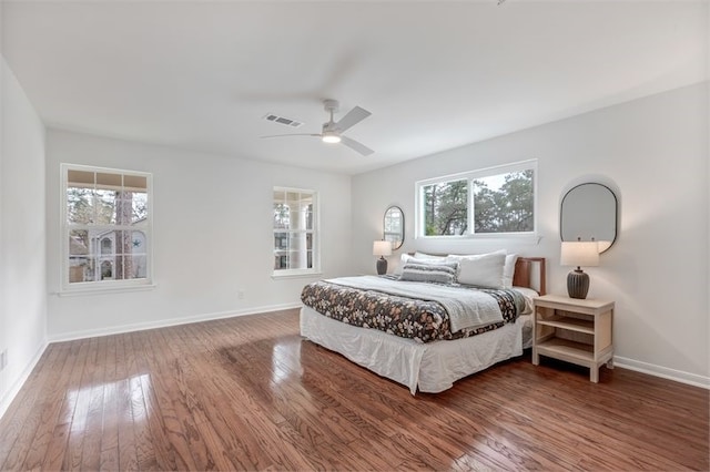 8018 Twining Oaks Ln, Spring, TX 77379 - bedroom featuring wood finished floors and a ceiling fan