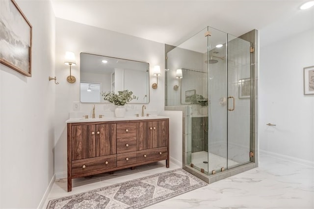 8018 Twining Oaks Ln, Spring, TX 77379 - bathroom with a stall shower, double vanity, marble finish floors, and recessed lighting