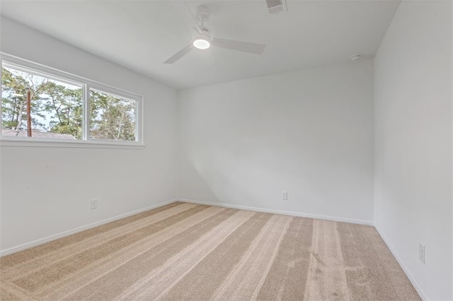 8018 Twining Oaks Ln, Spring, TX 77379 - unfurnished room featuring a ceiling fan and light colored carpet