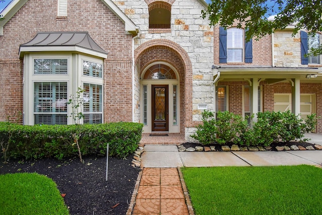 19510 Cisco Ct, Cypress, TX 77433 - view of exterior entry featuring stone siding and brick siding