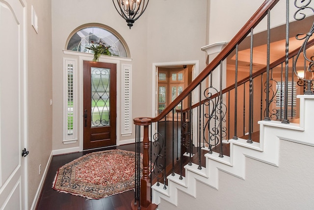 19510 Cisco Ct, Cypress, TX 77433 - entrance foyer featuring plenty of natural light, wood finished floors, a chandelier, stairs, and a high ceiling